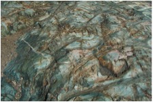 Metamorphism of the original rock produces a number of green minerals